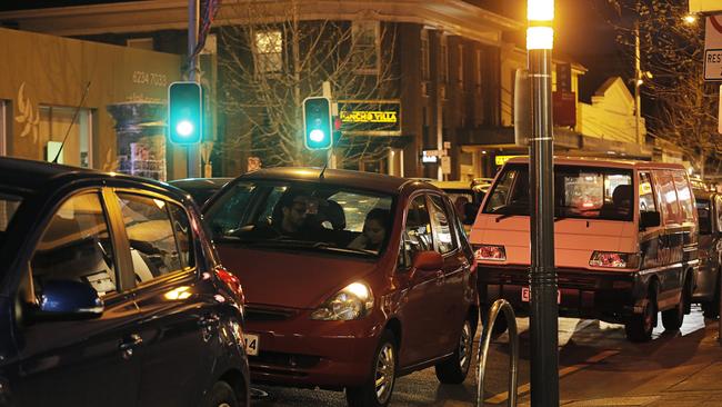 North Hobart's restaurant strip is apparently choked with Uber Eats drivers ramping — occupying parking spaces until they get an order to collect. Picture: MATHEW FARRELL