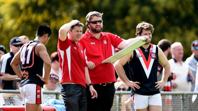 Scott Bamford (pictured left) in 2015 coaching Para Hills in the division five Adelaide Footy League grand final. The Big Reds prevailed but withdrew teams due to a lack of numbers the following year. Picture: Sam Wundke.