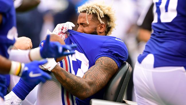 Odell Beckham Jr of the New York Giants is carted off the field.