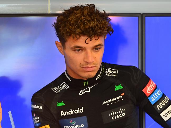 BAKU, AZERBAIJAN - SEPTEMBER 14: Lando Norris of Great Britain and McLaren looks on in the garage during final practice ahead of the F1 Grand Prix of Azerbaijan at Baku City Circuit on September 14, 2024 in Baku, Azerbaijan. (Photo by James Sutton/Getty Images)