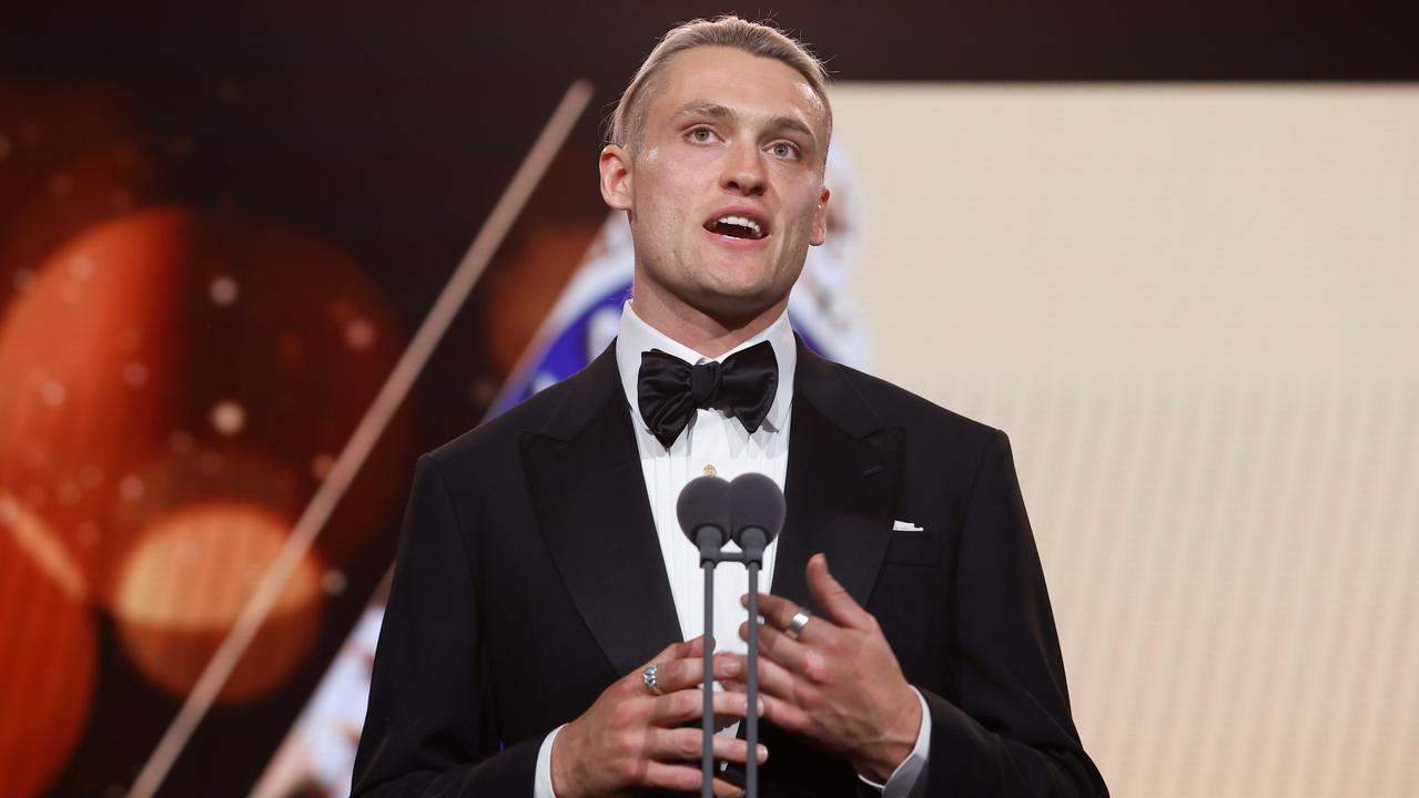 MELBOURNE, AUSTRALIA - SEPTEMBER 25: Darcy Moore of the Magpies pays tribute to players passed during the 2023 Brownlow Medal at Crown Palladium on September 25, 2023 in Melbourne, Australia. (Photo by Dylan Burns/AFL Photos via Getty Images)