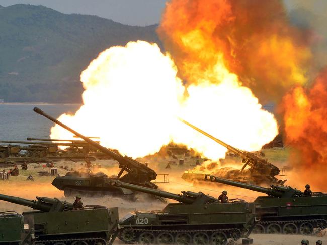 A fire demonstration of North Korean People's Army artillery. These are aimed at South Korea’s population centre — and capital — Seoul. Picture: AFP/KCNA