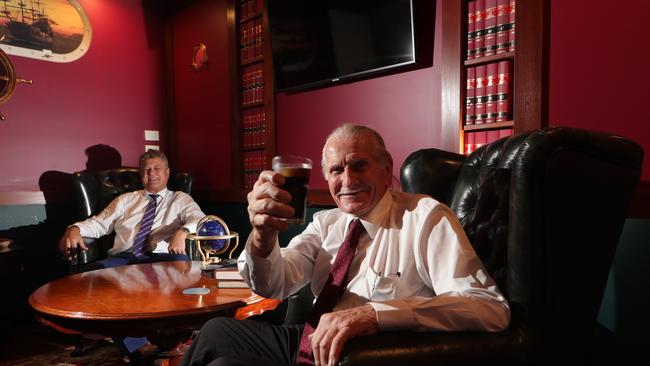 Barrister Chris Garlick watches on as Will "the wrecker" Smith toast success in the courts, at his Southport Chambers. Picture Glenn Hampson.