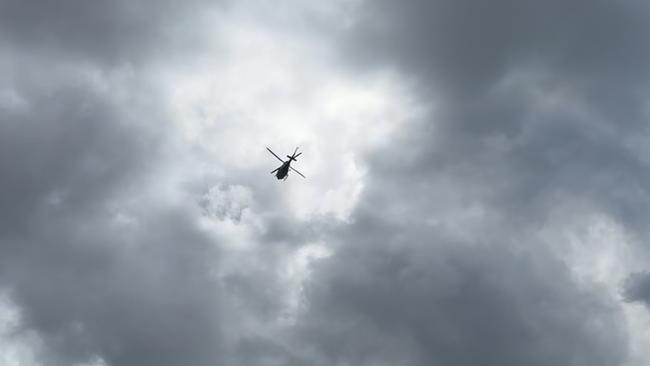 Choppers flew over Childers in the search for Peter Hodgins.