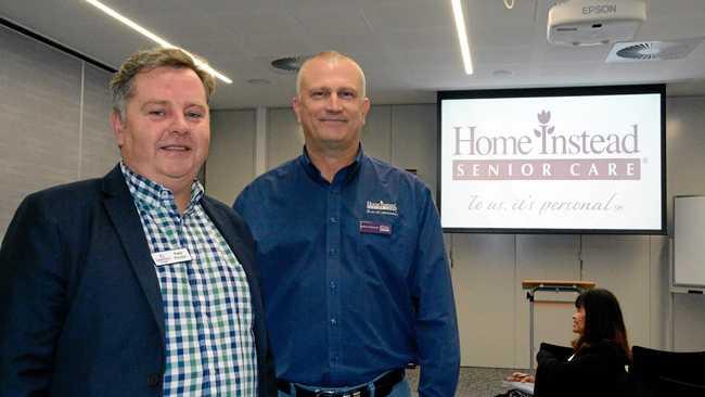 TALKING POINT: Carers Queensland team leader Peter Proctor (left) and Home Instead Client Services representative Andrew McCarthy prepare for the information seminar section at Toowoomba's first death cafe. Picture: Alexia Austin