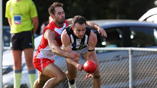 Clarence's Clint Riley tackles Glenorchy's Jaye Bowden during the TSL game between Clarence v Glenorchy from Richmond Oval. Picture: Zak Simmonds