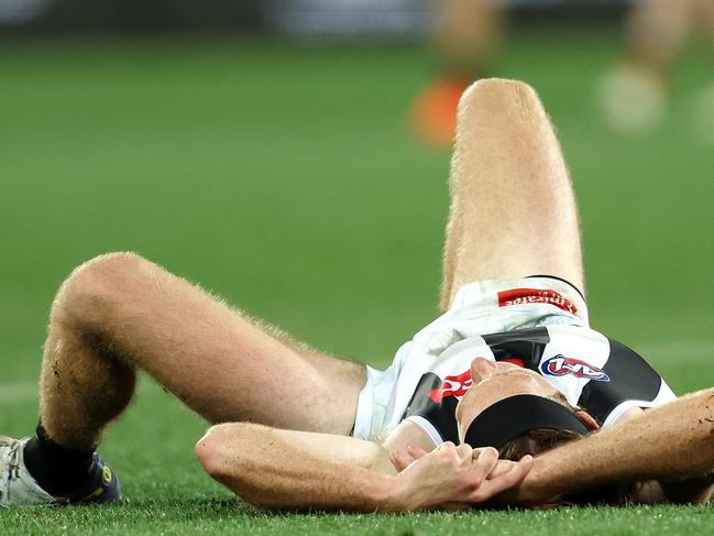 Collingwood defender Nathan Murphy after being knocked out. Picture: Sarah Reed/AFL Photos via Getty Images