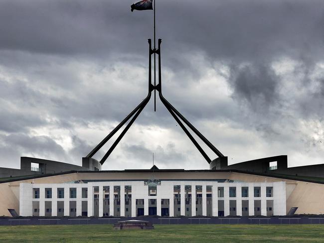 CANBERRA, AUSTRALIA NewsWire Photos - SEPTEMBER 20, 2021: COVID-19 and bad weather has kept most Canberrans inside as the ACT records 7 new cases. Storm clouds gather over Parliament House in Canberra.Picture: Newswire/Gary Ramage