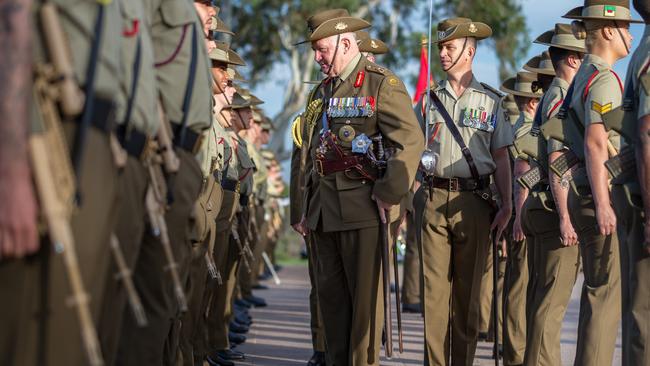 Sir Peter Cosgrove inspects the parade during the Australian Army's 118th birthday celebrations at the Australian War Memorial, Canberra.