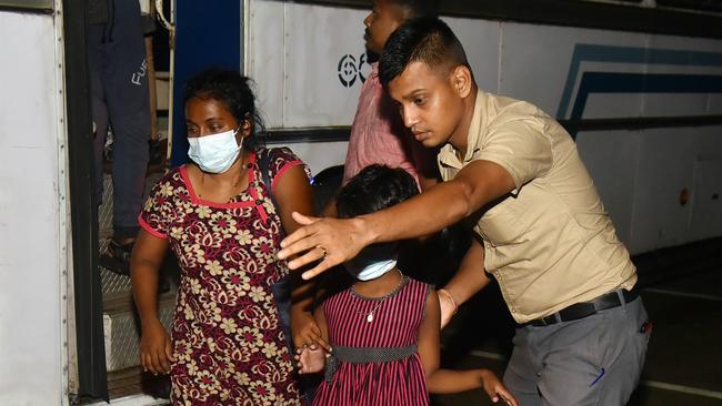 A mother and daughter, 8, on their return to Sri Lanka. Picture: Pradeep Pathirana