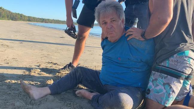 Peter Foster was arrested by detectives on a Port Douglas beach while going for walk with his dogs. Picture: IFW Global