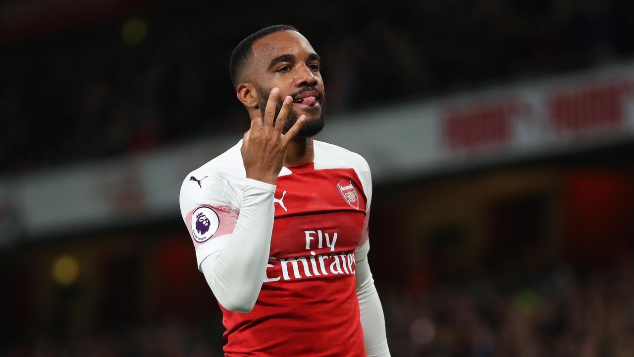 Alexandre Lacazette celebrates Arsenal’s second goal on route to securing third spot on the Premier League ladder.