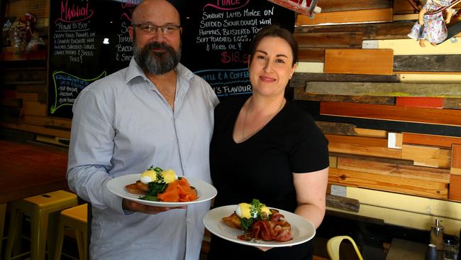 Peter Batley and partner Julie Rogers with their eggs benny. Photo: David Clark