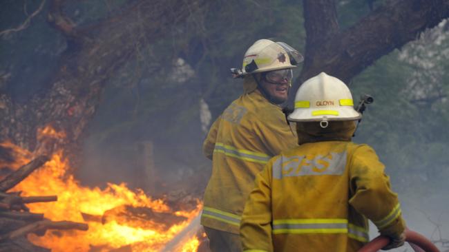 CFS volunteers putting out fires. Photo: Sam Wundke.