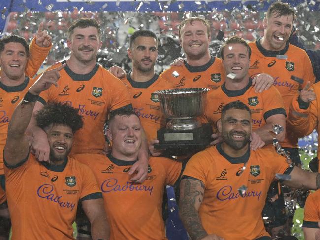 Wallabies players celebrate their win over Argentina. Picture: AFP