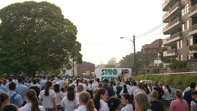 Hundreds of people took part in the Step Out Speak Out march (pictured) from Randwick to Coogee just hours before the assault. Picture: Carmen Rotolo