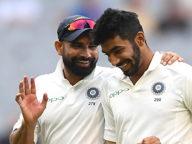 MELBOURNE, AUSTRALIA - DECEMBER 29: Mohammed Shami and Jasprit Bumrah of India chat during day four of the Third Test match in the series between Australia and India at Melbourne Cricket Ground on December 29, 2018 in Melbourne, Australia. (Photo by Quinn Rooney/Getty Images)