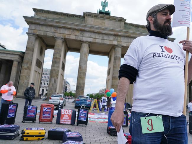 Travel agency workers protest to demand state assistance in front of the Brandenburg Gate in Berlin. Picture: Getty Images