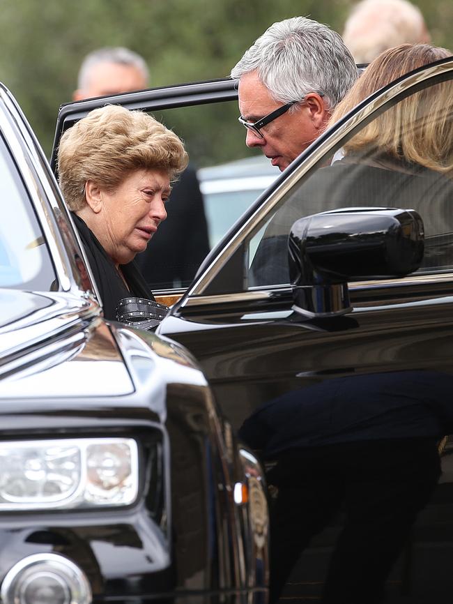 Another mourner arrives for the funeral. Picture: Ian Currie