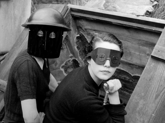 Fire Masks, one of Lee Miller’s first war images depicted two models in masks issued by Air Raid Protection wardens to protect them from incendiary bombs. It was considered perhaps too macabre for publication.