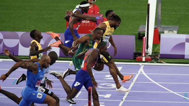 Kerley (second from top) took bronze at the Paris Olympics. (Photo by Dimitar DILKOFF / AFP)