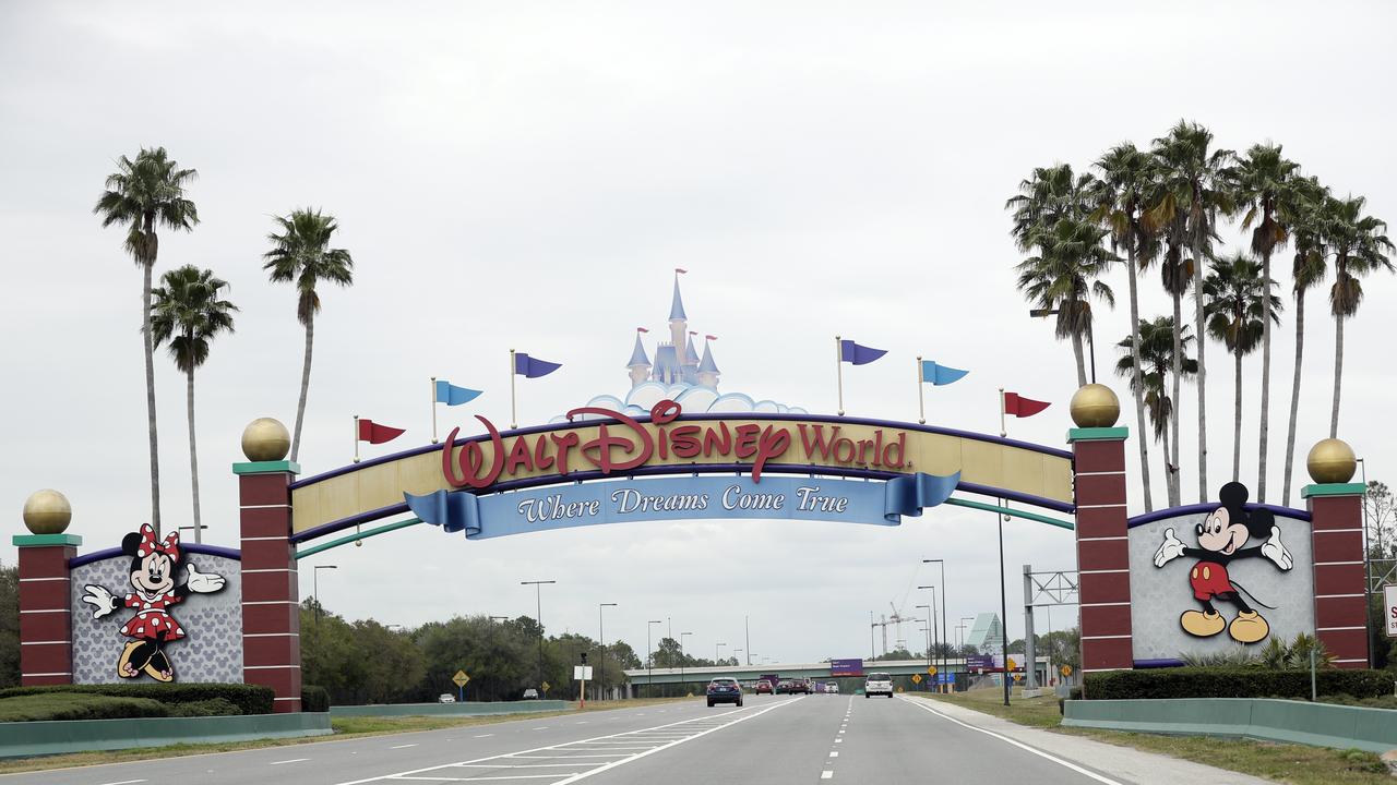 The road to the entrance of Walt Disney World in Lake Buena Vista, Florida has few cars. Picture: John Raoux/AP