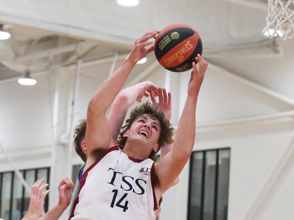 Basketball Australia Schools Championships at Carrara. Mens open final, Lake Ginninderra College Lakers V TSS (in white). Tss's Nikos Karathanasopoulos takes a rebound in the final. Picture Glenn Hampson