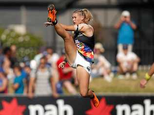 THE STORM: The image which caused all the controversy - AFL Media photographer Michael Willson's snap of Carlton forward Tayla Harris kicking for goal against the Western Bulldogs in round seven of the AFLW. Picture: Michael Willson/AFL Media