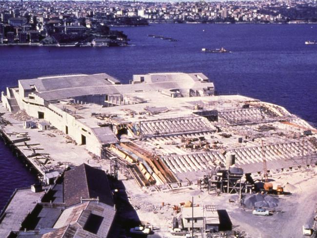 Bennelong Point in 1962, the site earmarked for the National Opera House. The project was expected to take four years, but took 10,000 workers 14 years to complete the ambitious design. Picture: Sydney Opera House Trust