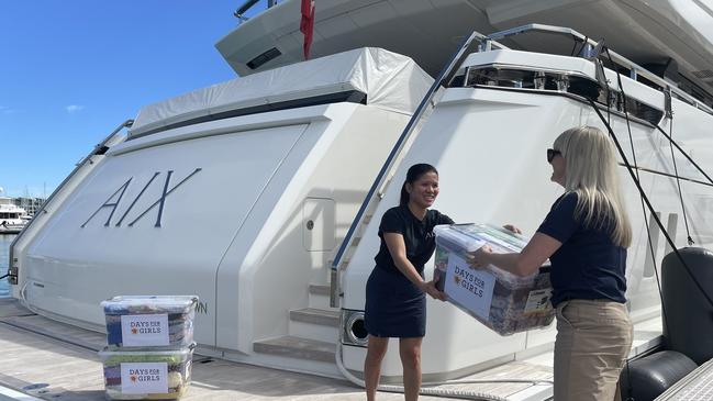 Superyacht AIX collecting Days for Girls Donations to Fiji at Coral Sea Marina. Photo: Contributed