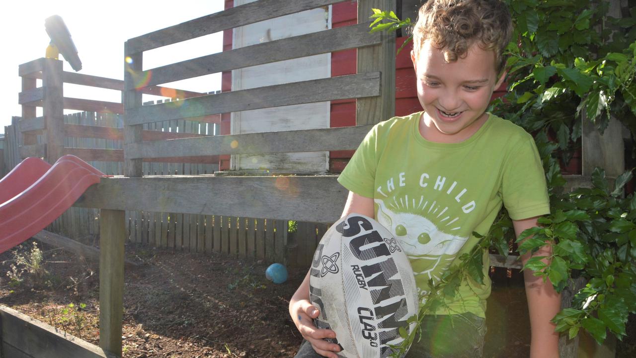 Archie Wilson, 8, lives with Tourette syndrome and loves to draw whatever comes to mind, and play outside on his trampoline, in his clubhouse or on the swings. Picture: Morgan Burley