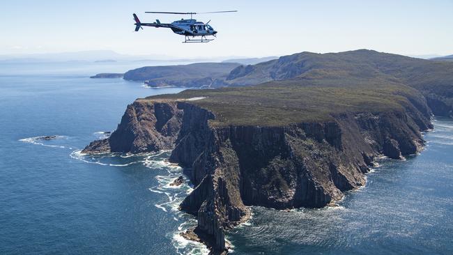 Osborne Heli Tours provide an incredible view of the Tasman Peninsula. Picture: Paul Hoelen Photography