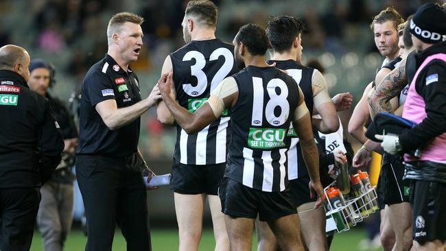 Nathan Buckley talks to the Collingwood forwards. Picture: Mark Dadswell