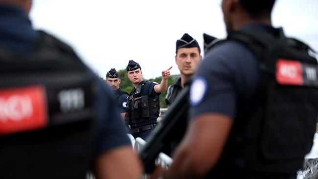 PARIS, FRANCE - JULY 26: Police are seen during the opening ceremony of the Olympic Games Paris 2024 on July 26, 2024 in Paris, France. (Photo by Alex Pantling/Getty Images)