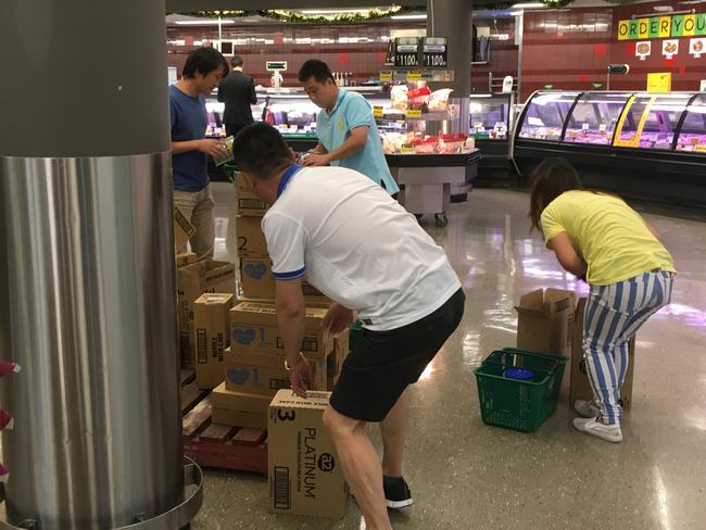 A Baby Formula Gang in action in Woolworths at Westfield Burwood.
