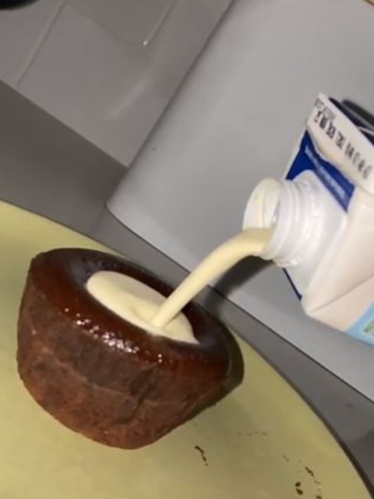 After putting it in the microwave for 30 seconds he poured cream onto it. Picture: ashe_media