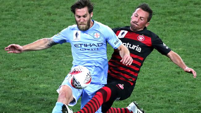 Wanderers midfielder Radoslaw Majewski makes a tackle on Melbourne City’s Josh Brillante in the FFA Cup quarter-finals. Picture: Getty Images