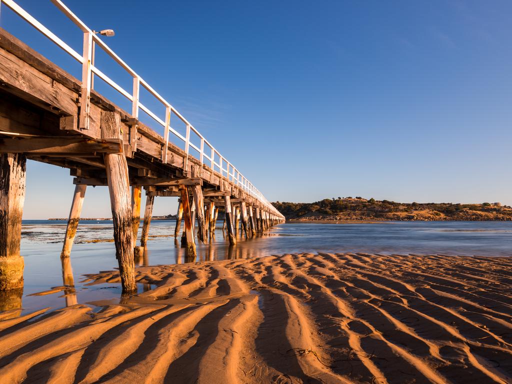 <h2>7. Victor Harbour</h2><p>Just over an hour from Adelaide lies the seaside town of <a href="https://encountervictorharbor.com.au/" target="_blank" rel="noopener">Victor Harbour</a> on the Fleurieu Peninsula. This is where sand, surf and wildlife intersects. Enjoy fish and chips on the beach, head to <a href="https://www.parks.sa.gov.au/find-a-park/Browse_by_region/Fleurieu_Peninsula/granite-island-recreation-park" target="_blank" rel="noopener">Granite Island</a>, home of the little penguins, or join a boat tour to see Southern Right whales from June to October. There&rsquo;s a range of accommodation available, from B&amp;Bs, to catered apartments and farm stays.</p>