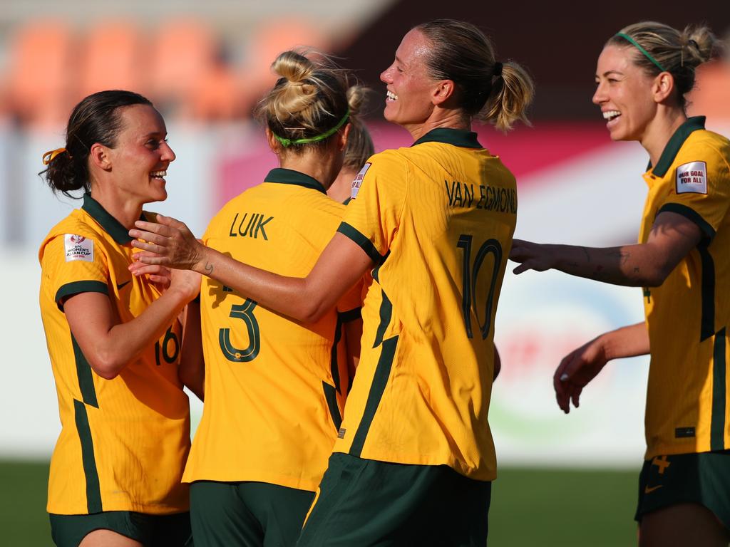 Emily van Egmond (second from right) and her Matildas teammates celebrate at the Asian Cup. Picture: Thananuwat Srirasant / Getty Images