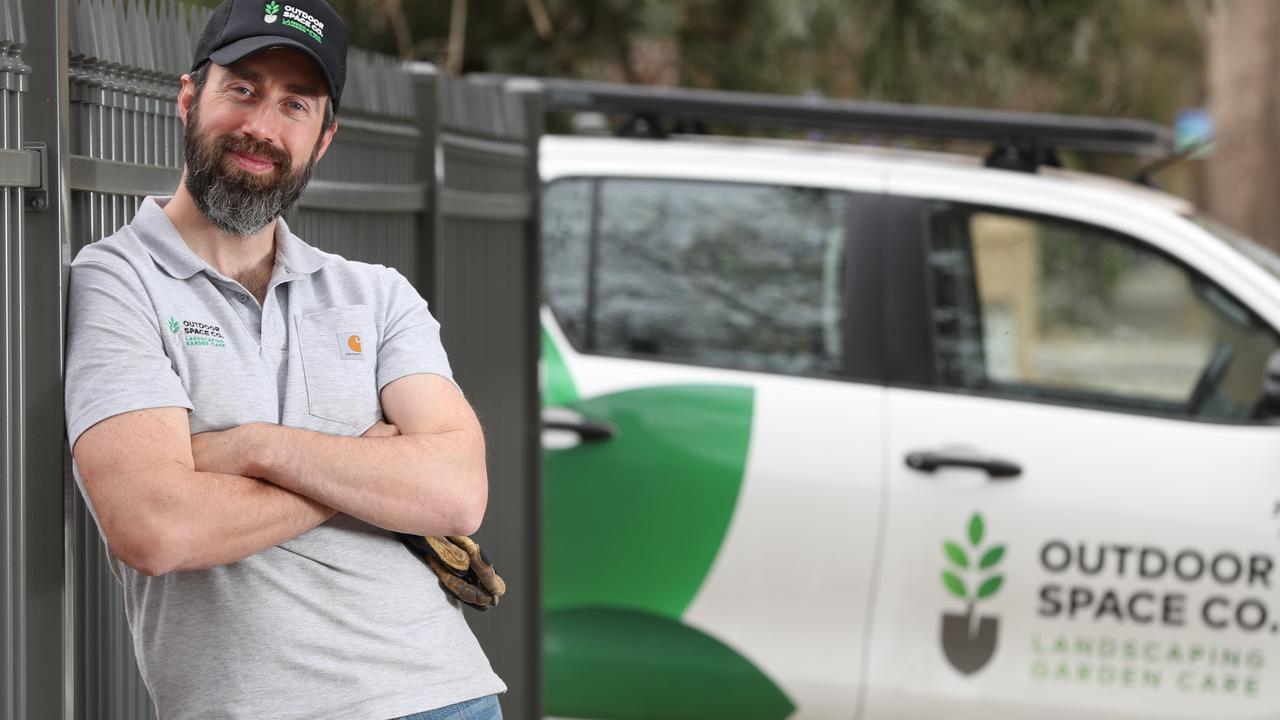 Anthony Penney at one of his four jobs, working as a landscaper. Picture: Tait Schmaal