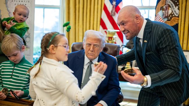 Conor McGregor, with his family, meets with President Trump in the Oval Office.