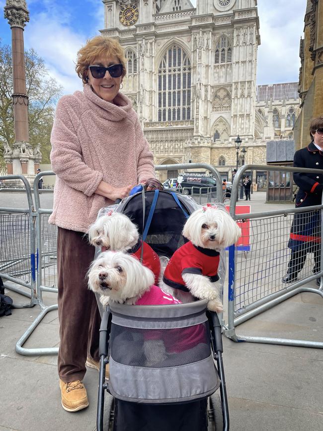 Denise Valentine and her dogs, outside Westminster Abbey. Picture: Cameron Stewart