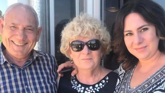 Angela Gerace with her parents Michael and Sue. Picture: Supplied