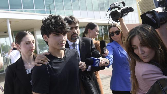 Dhirren Randhawa, centre, leaving Christies Beach Magistrates Court with his mother Amreeta Stara, right. Picture: NCA NewsWire / Roy VanDerVegt