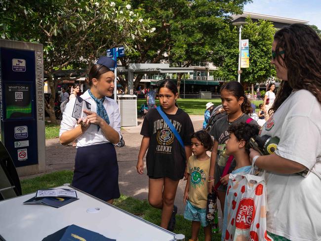 Hope handing over the passport to all the people to find their Easter egg. Picture: Pema Tamang Pakhrin