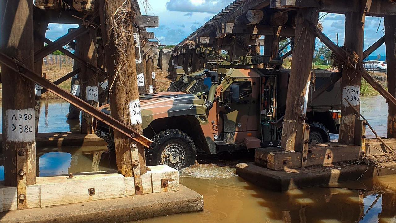 Australian Army soldiers from 2nd/14th Light Horse Regiment (Queensland Mounted Infantry) clear and proved a route for State Emergency Services in Gatton, Queensland, as part of Operation Flood Assist 2022. Photo: ADF.