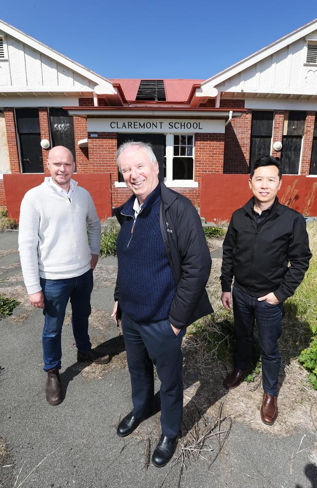 Staff from Circa Morris-Nunn Architects [L-R] associate director Dik Jarman, leading architect Robert Morris-Nunn and project director Ganche Chua in front of the old Claremont School. Picture: Zak Simmonds