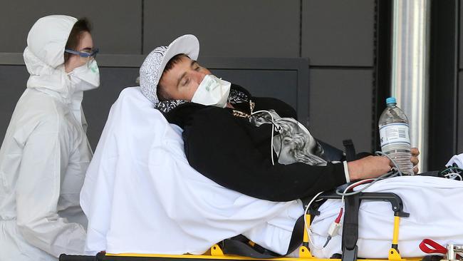 A man suspected of having the Ebola virus arrives at Gold Coast University Hospital. Picture Glenn Hampson