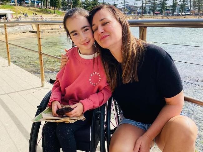 Isabella Lombardo with her mum, Libby, who has no idea how her daughter acquired cerebral palsy after her straight forward birth.