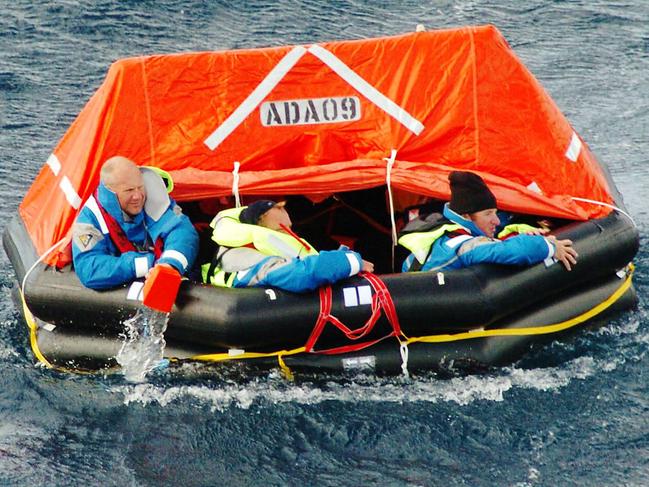 NEWS: Ian Mainsbridge photographs of the rescue at sea of  the crew of Sydney Hobart yacht Skandia.